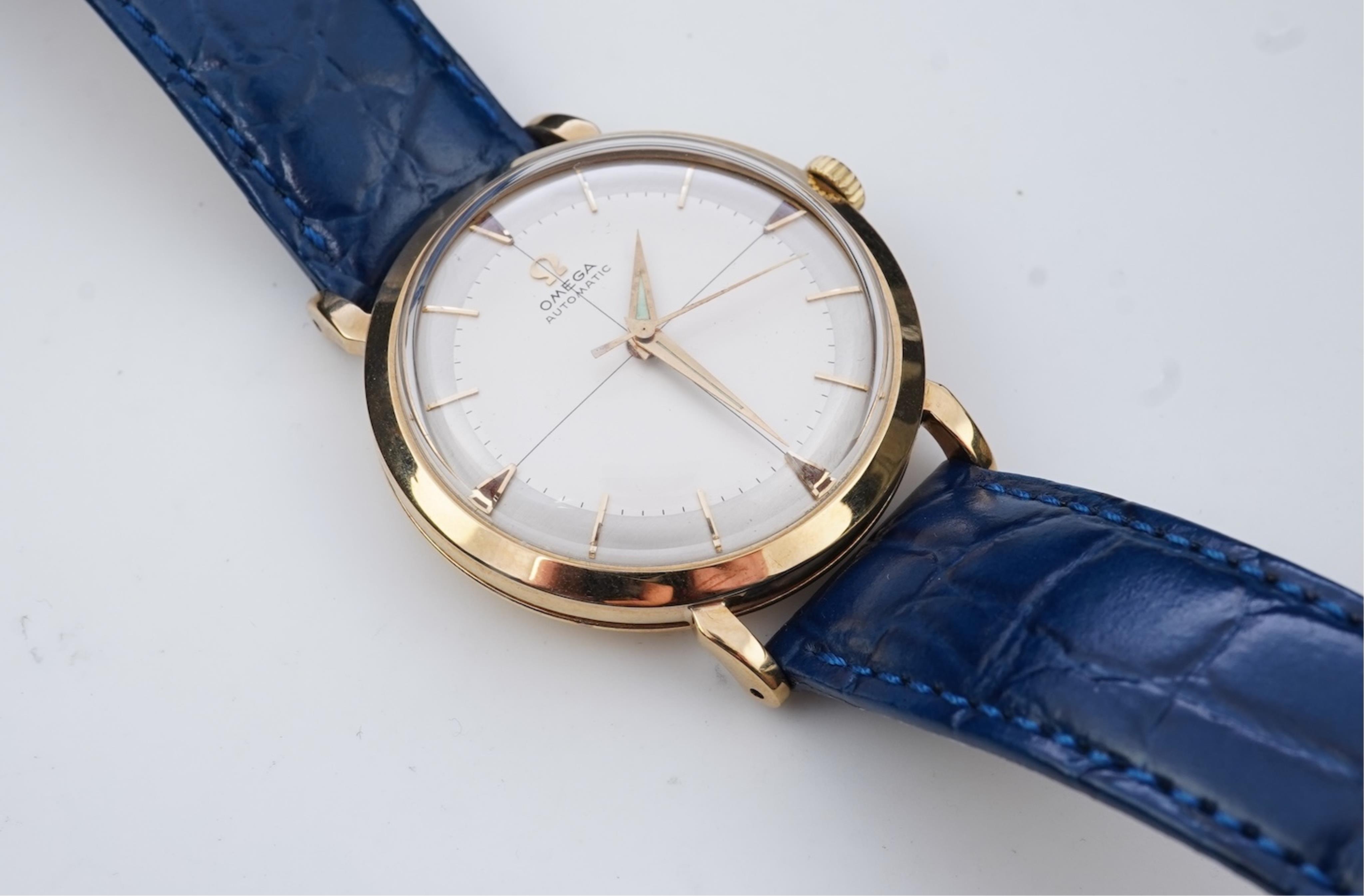 A gentleman's late 1950's 9ct gold Omega Automatic wrist watch